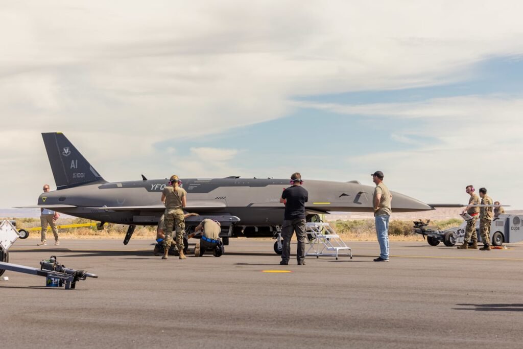 US Air Force F-22 pilot controls unmanned FQ-44 in flight